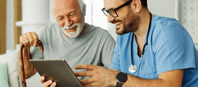 provider and patient reviewing a tablet