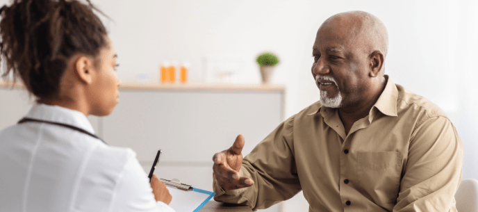 man speaking with his doctor