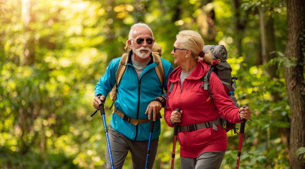 Couple walking in the woods