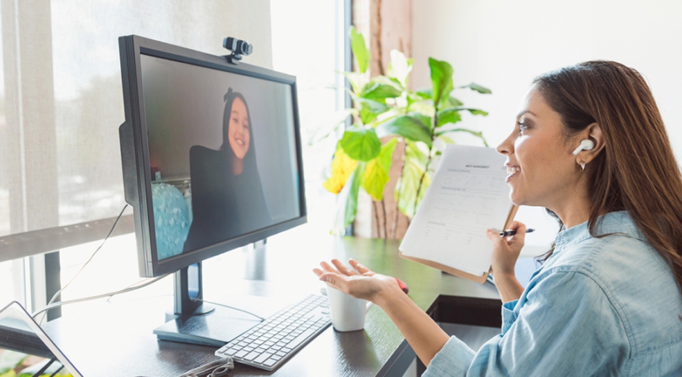 Woman on a telehealth call on her computer