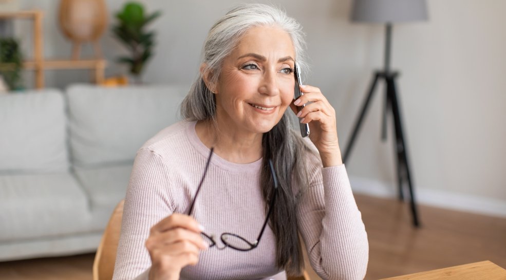 Senior woman calling customer service case management phone