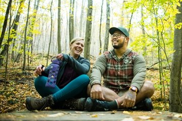 couple hiking in the woods of Vermont