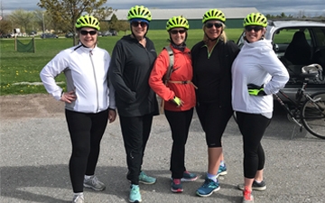 Group of women cycling during Wellness Revolution program